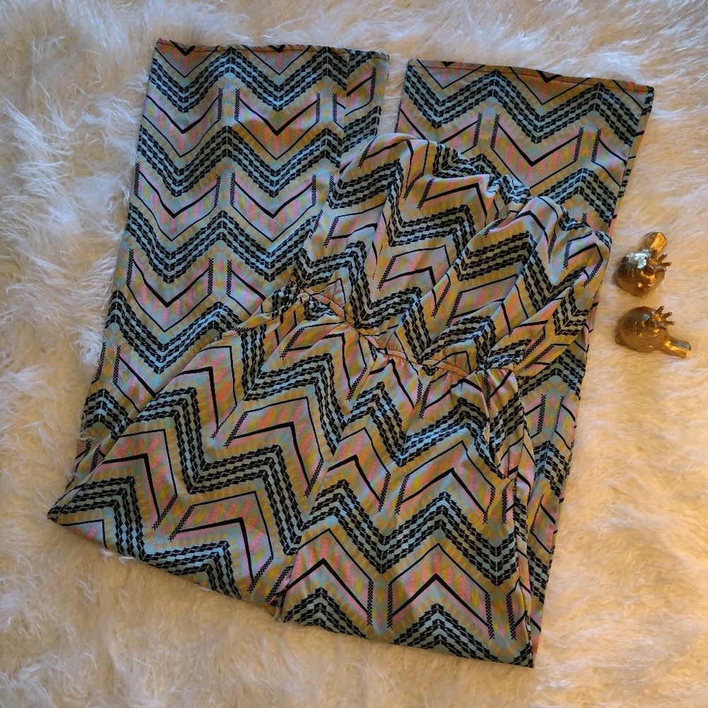 Long strapless geometric print romper.